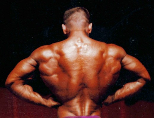 Bodybuilding rear lat spread pose